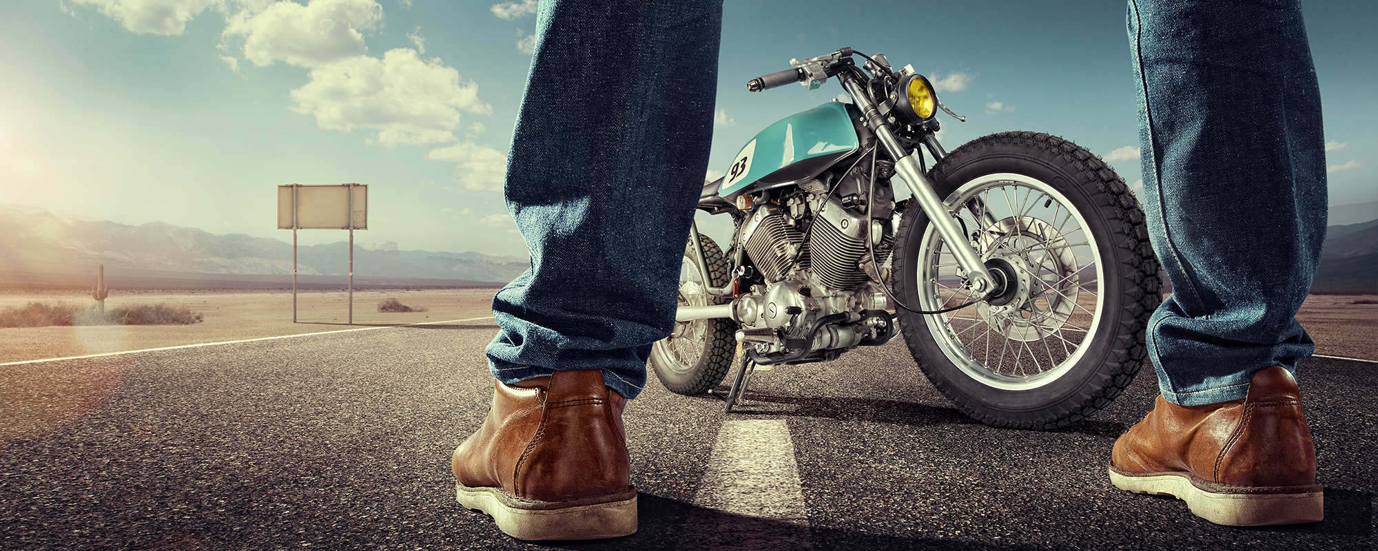 Biker Standing near Motorcycle